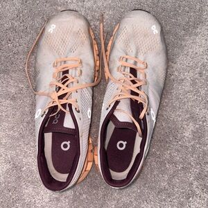 On Running Shoes with Purple and Tan Accents